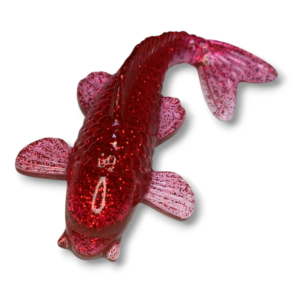 Vibrant Red Decorative Koi Fish Figurine with Textured Scales and Prominent Fins